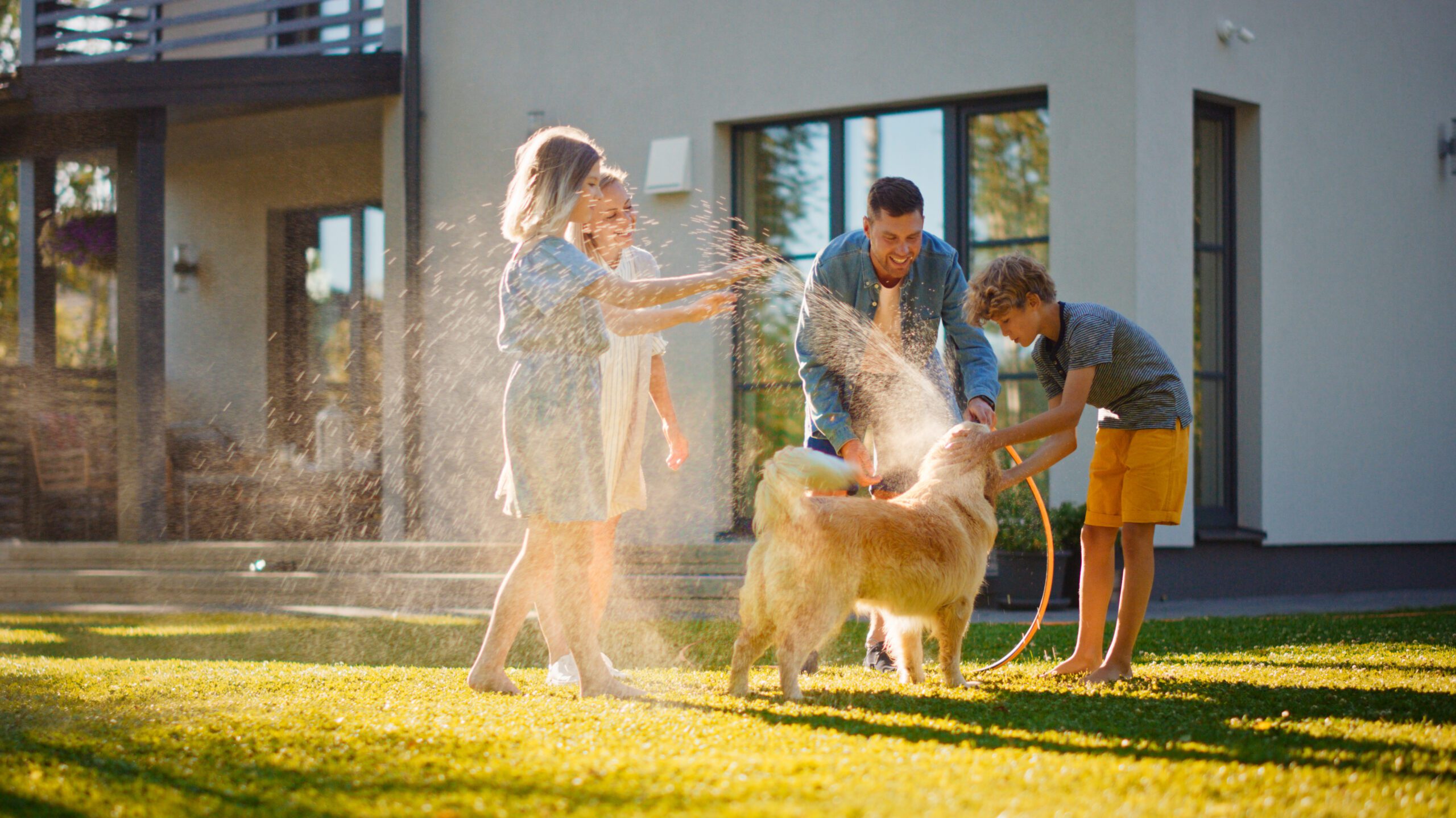 Family with water hose