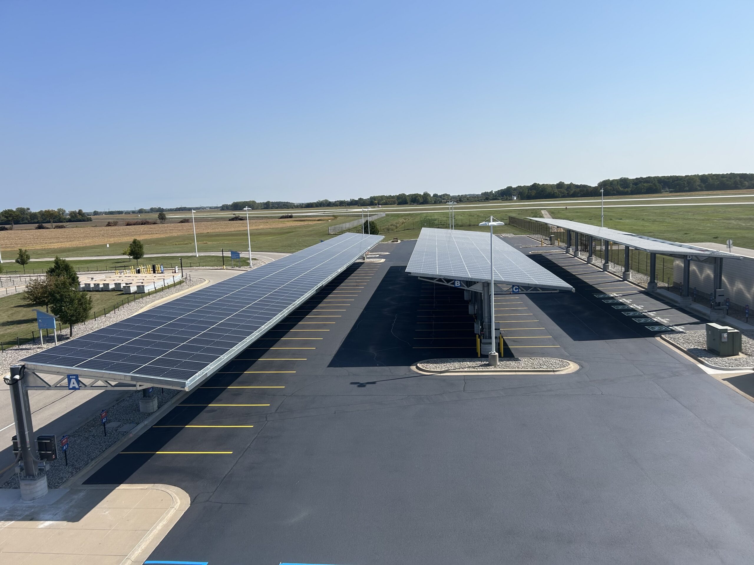 Well Drilling Upscaled Mbs International Airport Solar Canopies in Parking Lot